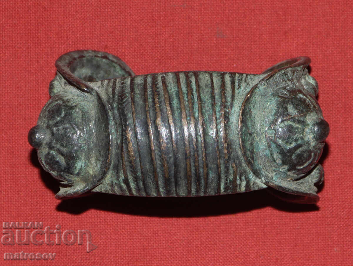 Old traditional bronze bracelet jewelry slingshot