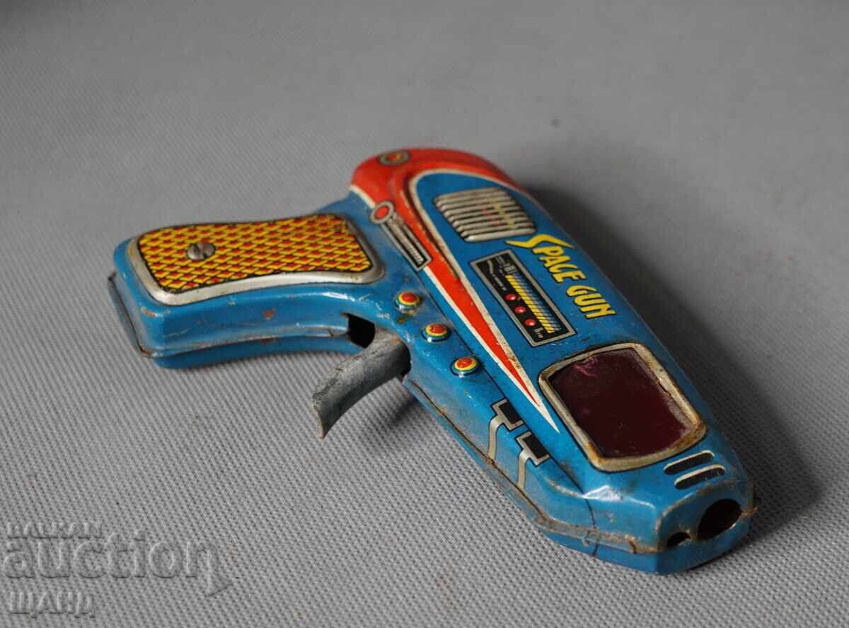 Delivery of Old Japanese metal mechanical toy space gun