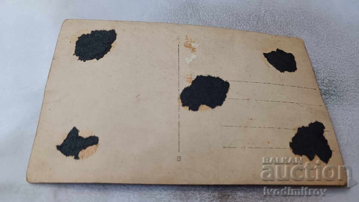 Delivery of Photo Officers and soldiers in front of a tent camp