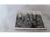 Photo Dobrich Soldier and men in corn field