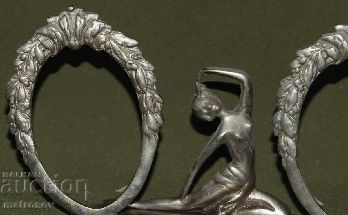 Auction  Metal double tabletop picture frame, female figure