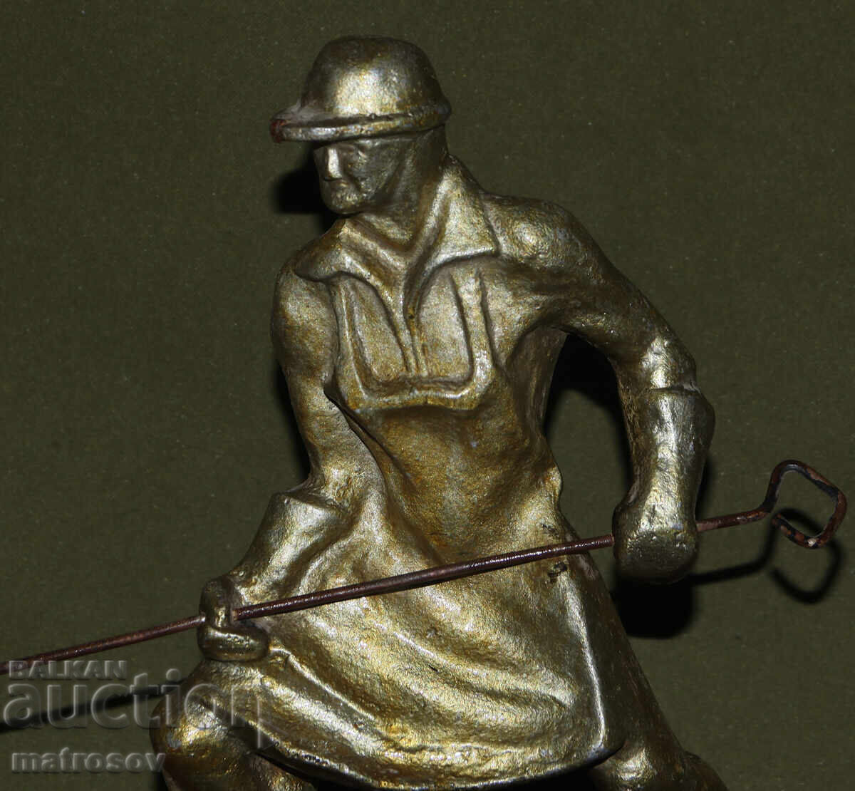 Auction  Handmade metal statuette, worker