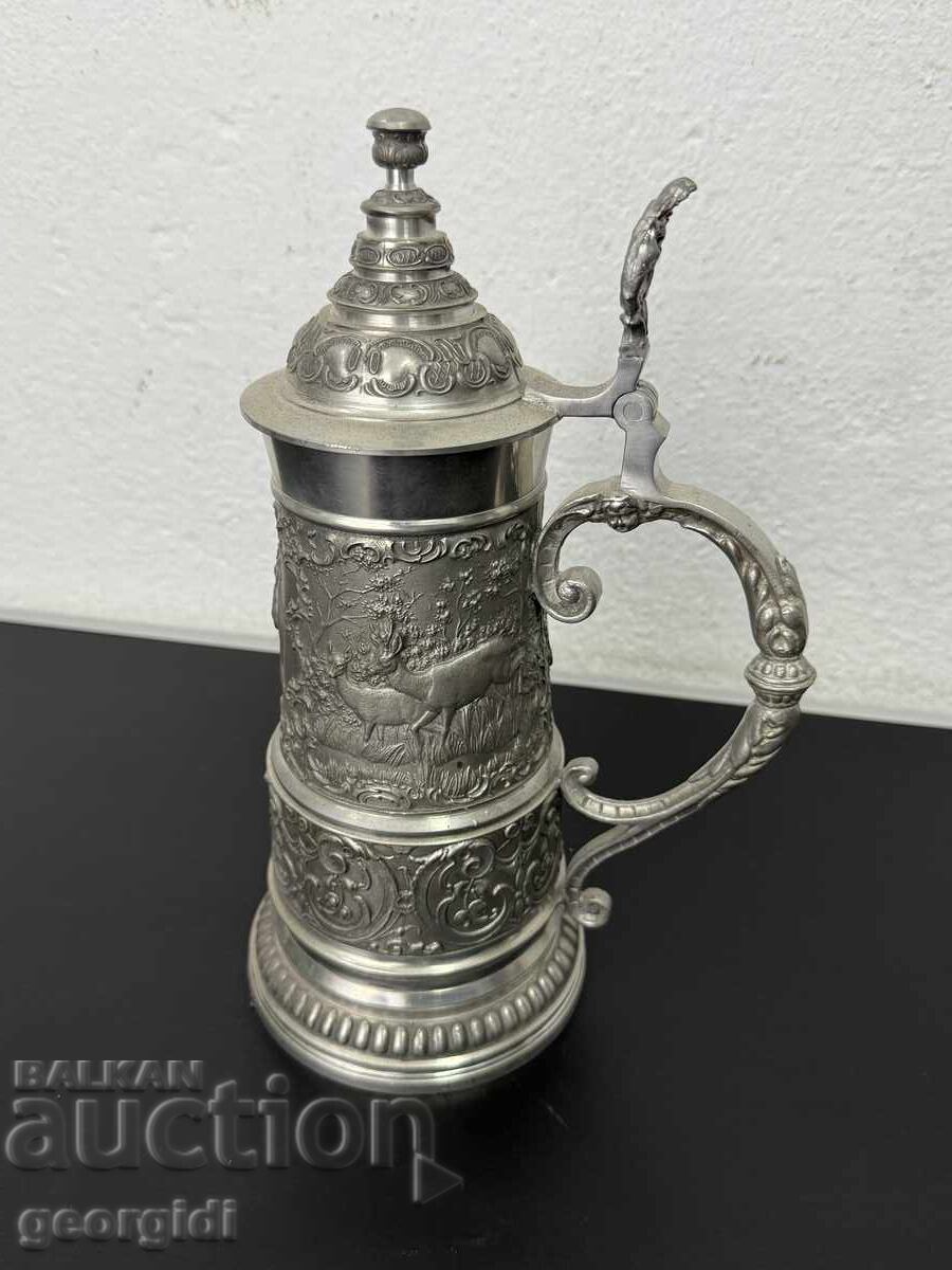 Licitație Cană unică de staniu cu capac / motive de vânătoare. Nr. 7460