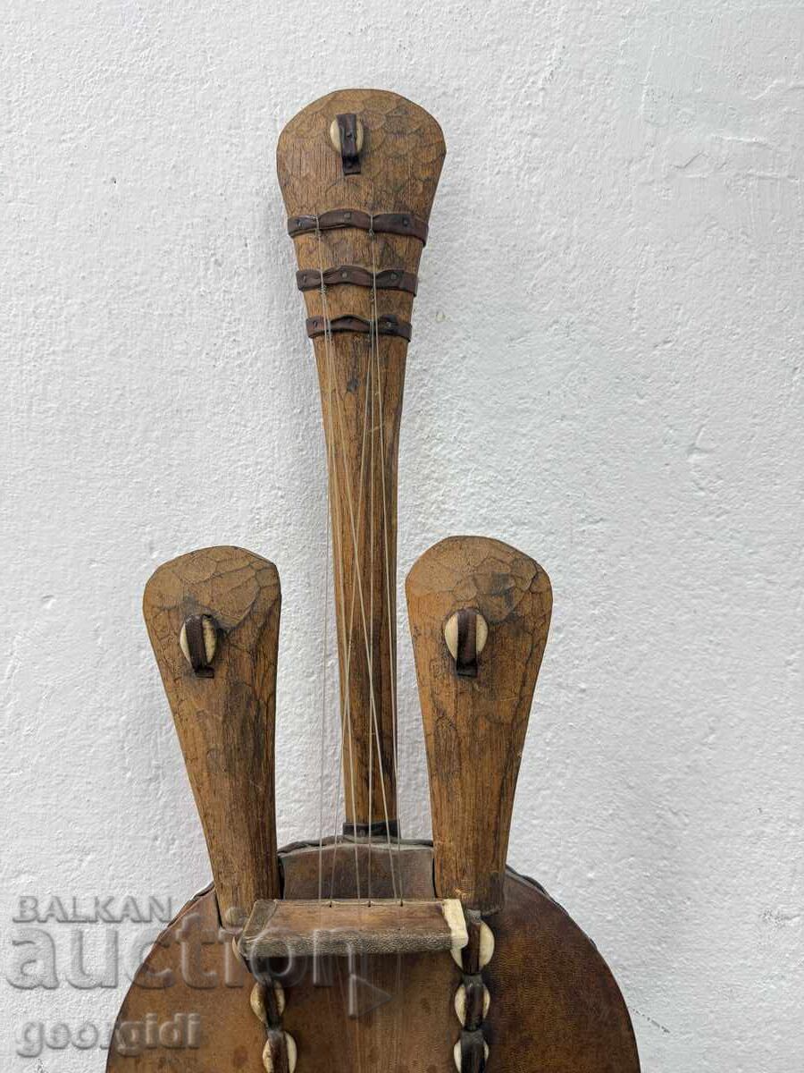 Auction  West African Stringed Instrument No. 7467