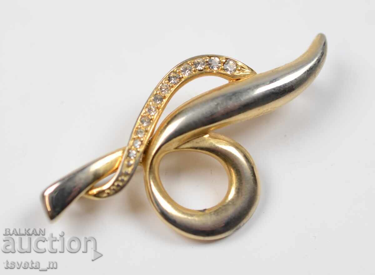 Licitație O broșă