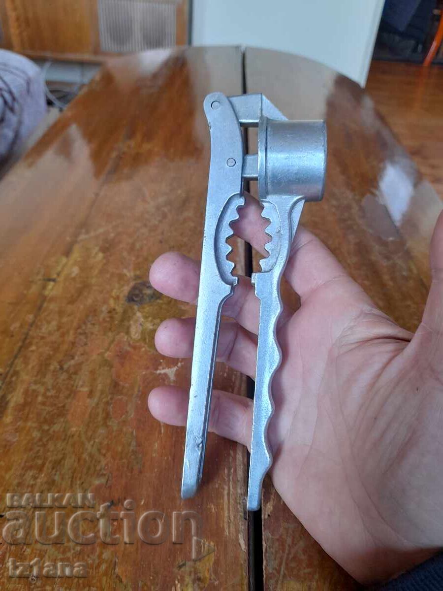 Auction Old garlic press, nutcracker Auction Old garlic press, nutcracker