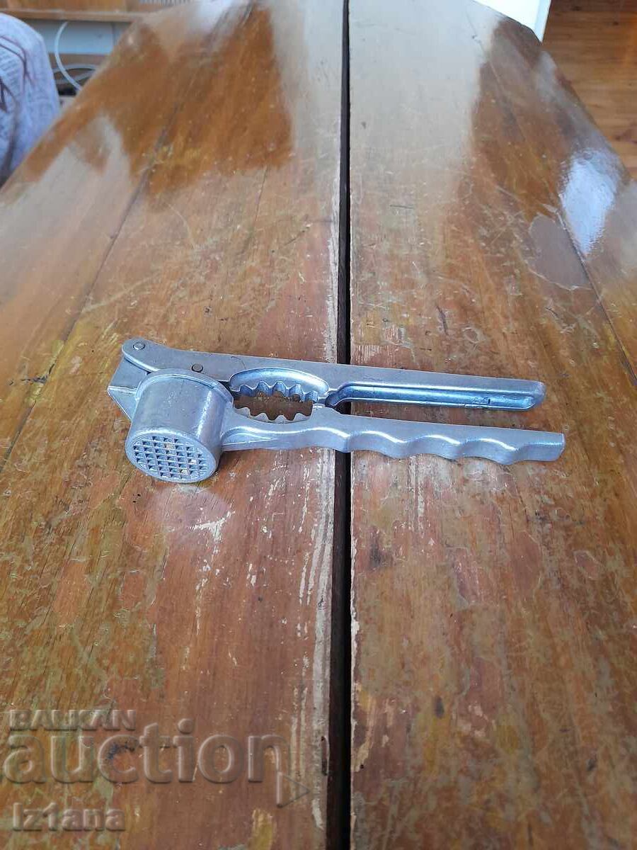 Old garlic press, nutcracker Old garlic press, nutcracker