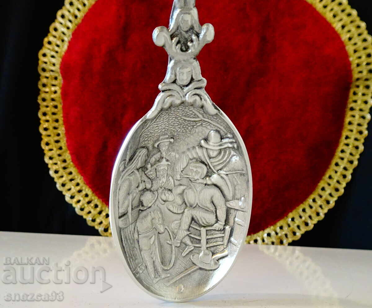 Delivery of Pewter spoon for a pewter wedding with family symbols