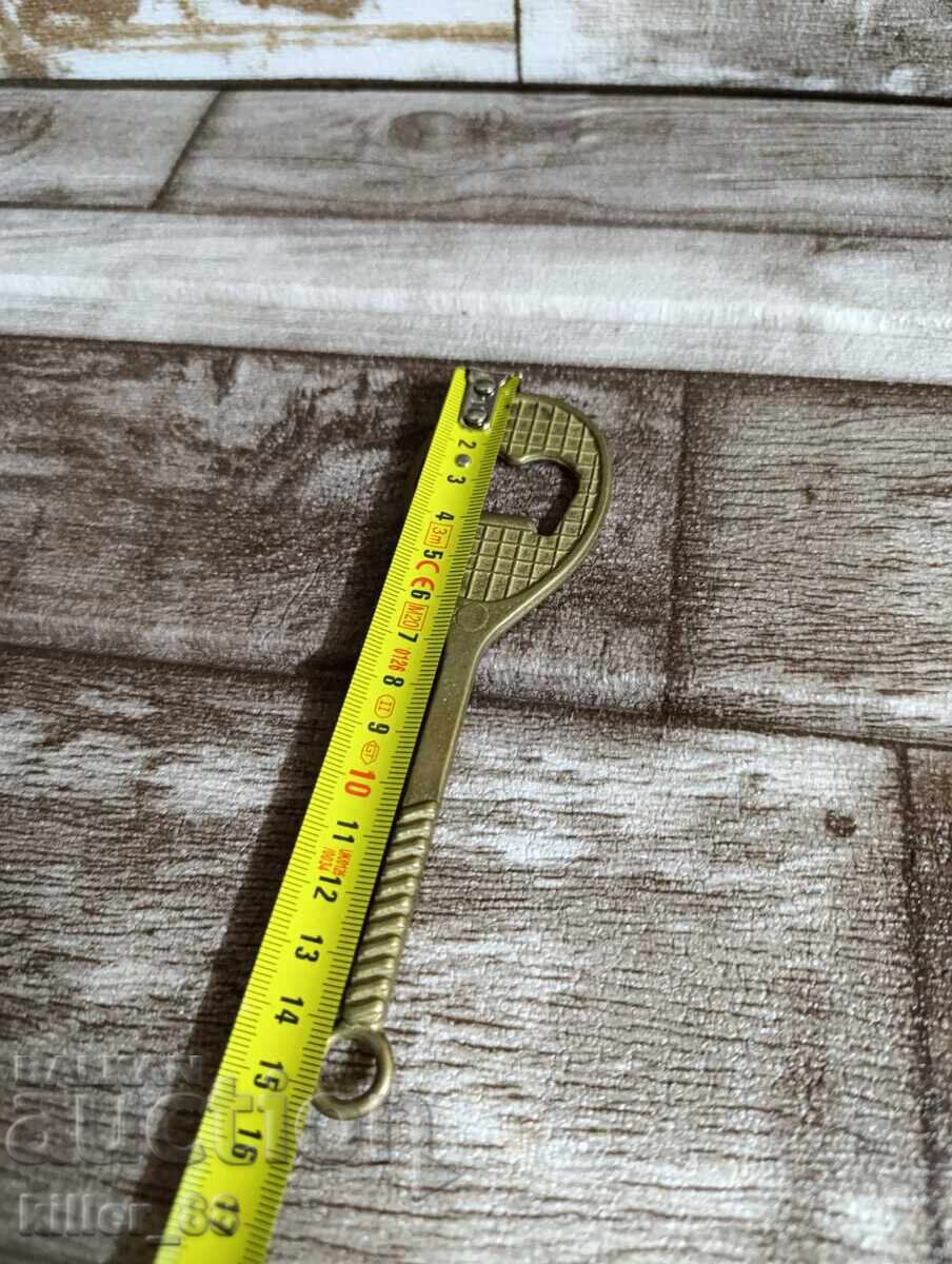 Auction  Tennis racket opener