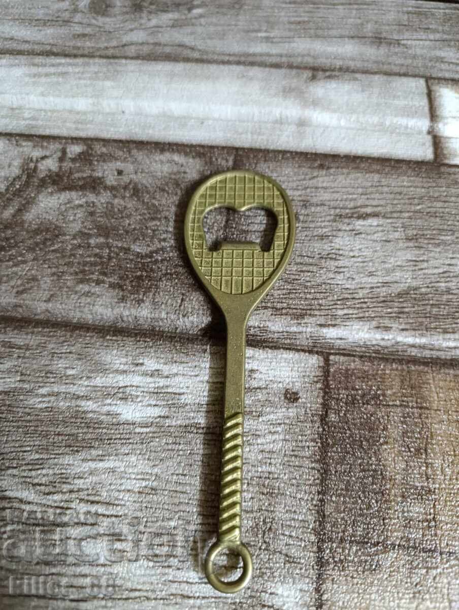 Tennis racket opener