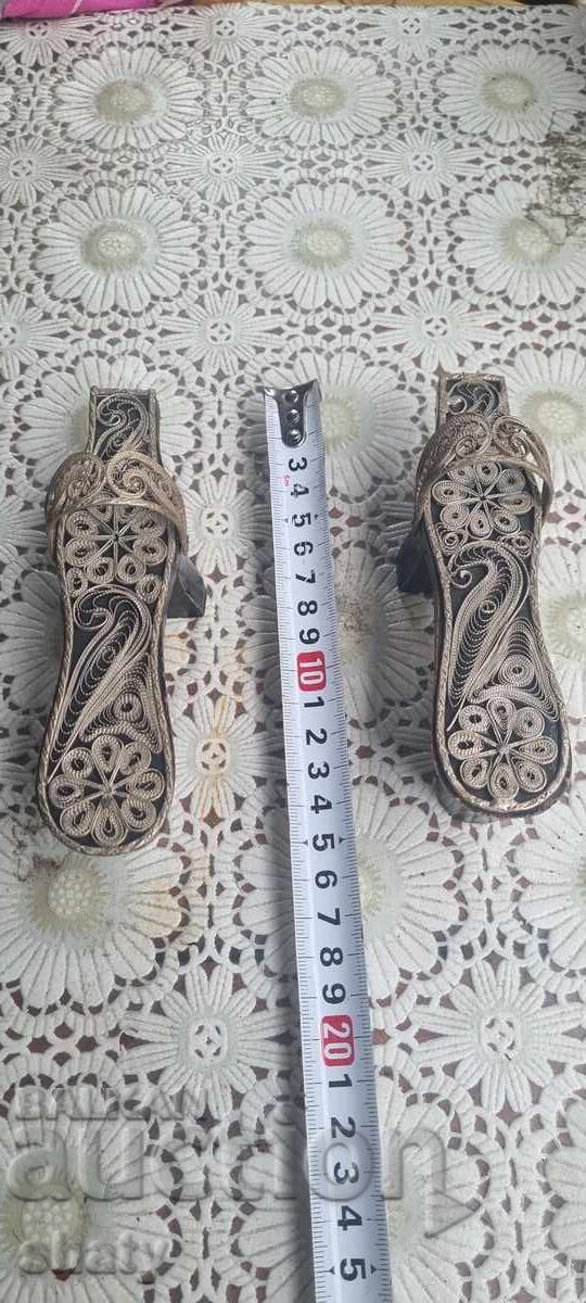 Old ritual filigree clogs