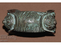 Brățară veche de bronz, tip praștie, cu cruce