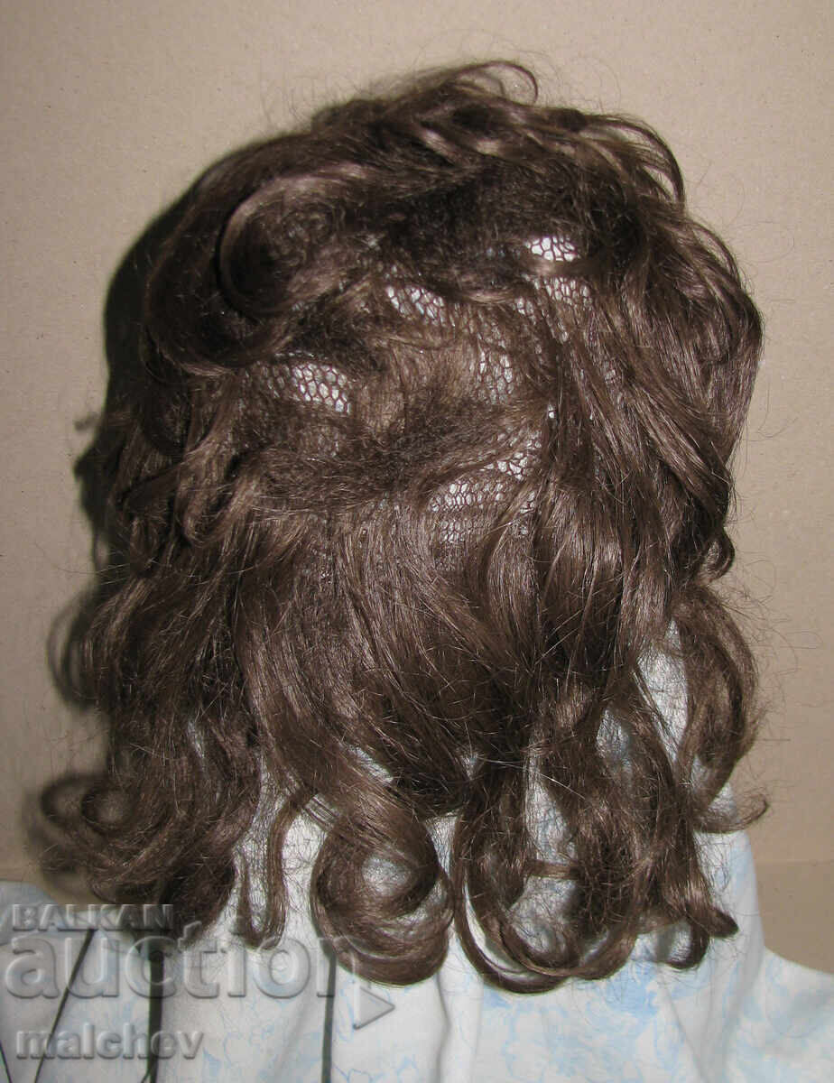 Delivery of Wig made of artificial hair, up to 40 cm, in good condition