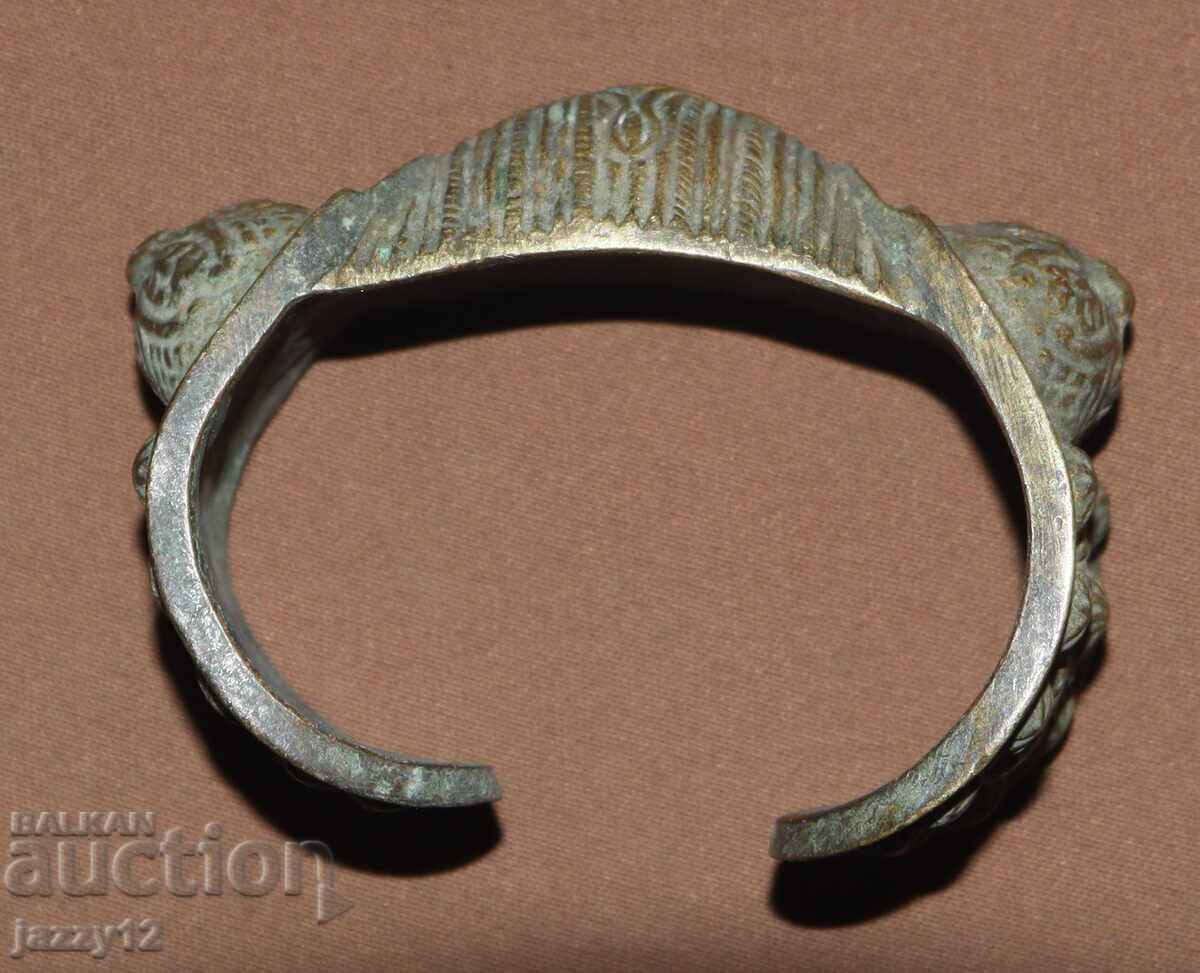 Auction  Old bronze bracelet slingshot with cross