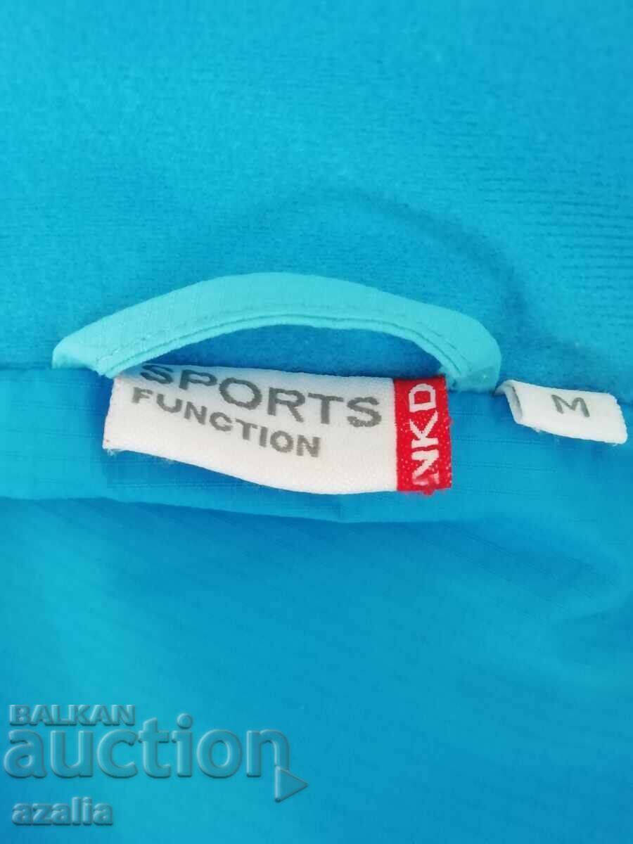 Delivery of Petrol blue softshell jacket with removable hood size M