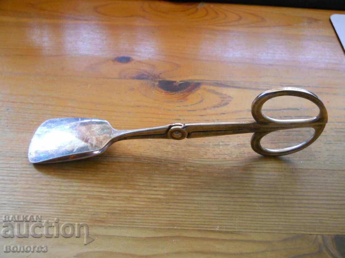 Посребрена щипка за сервиране на сладкиши - Германия с цена 30.00 лв. | € 15.34 Посребрена щипка за сервиране на сладкиши - Германия с цена 30.00 лв. | € 15.34