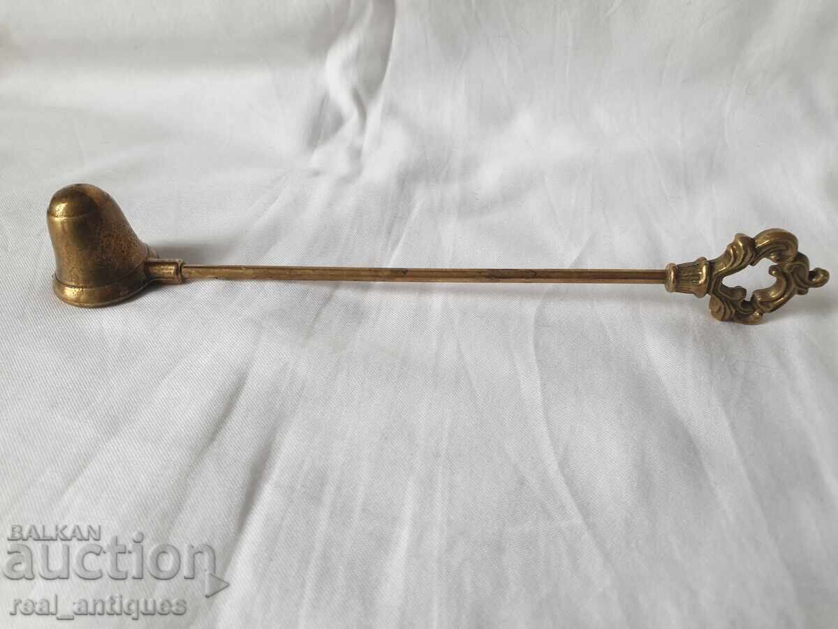 Bronze candle snuffer Bronze candle snuffer