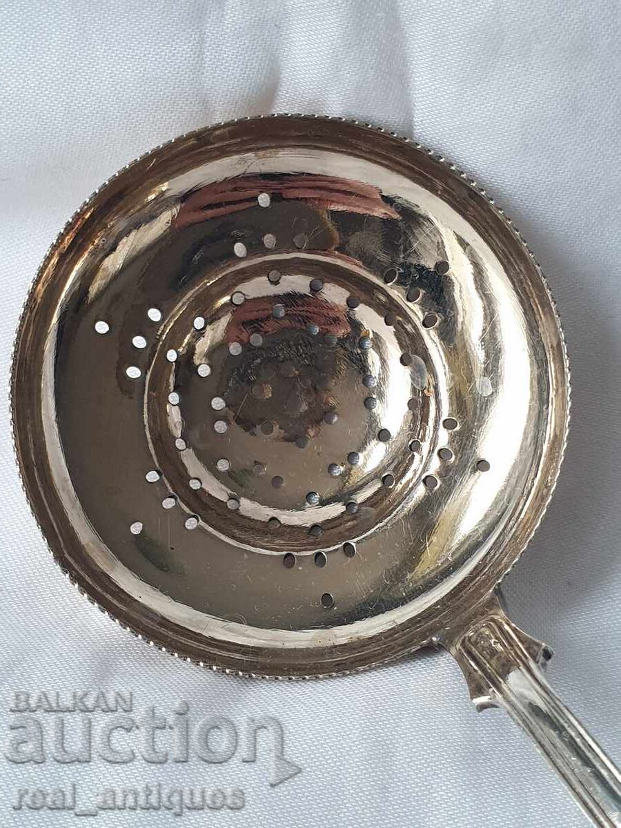 Auction  Silver-plated serving utensils