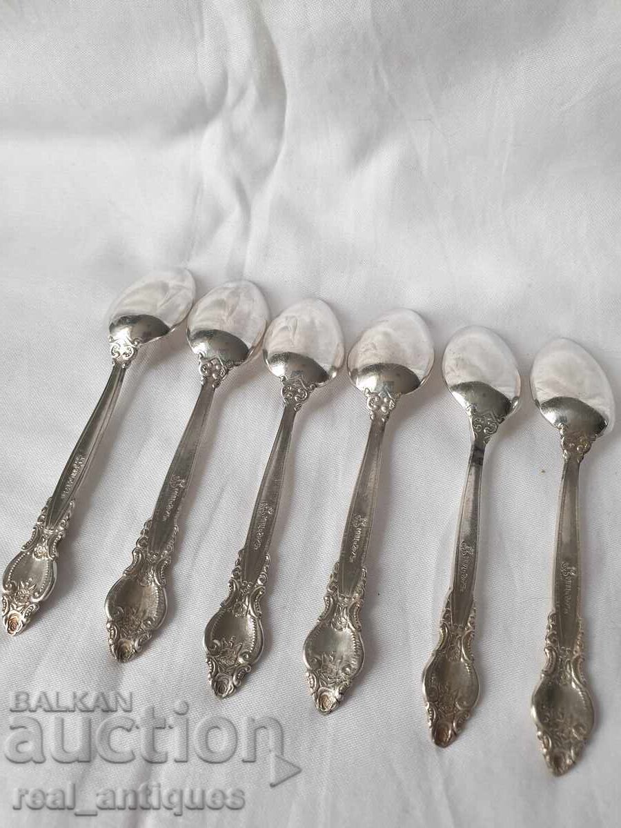 Delivery of Set of silver plated spoons