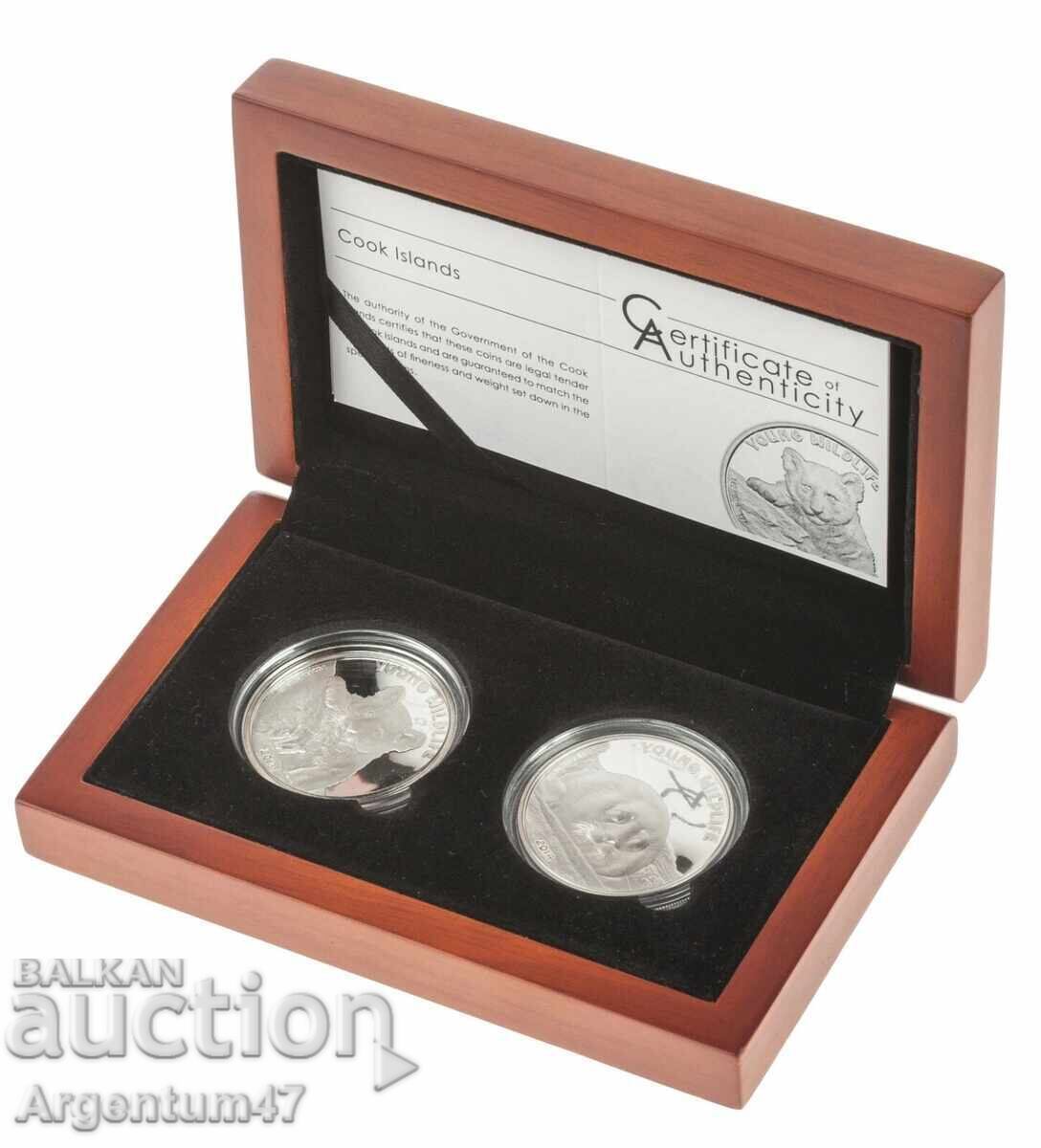 СРЕБРО 2X1 OZ 2023 ОСТРОВИ КУК - БЕБЕ ТЮЛЕН И БЕБЕ ТИГЪР