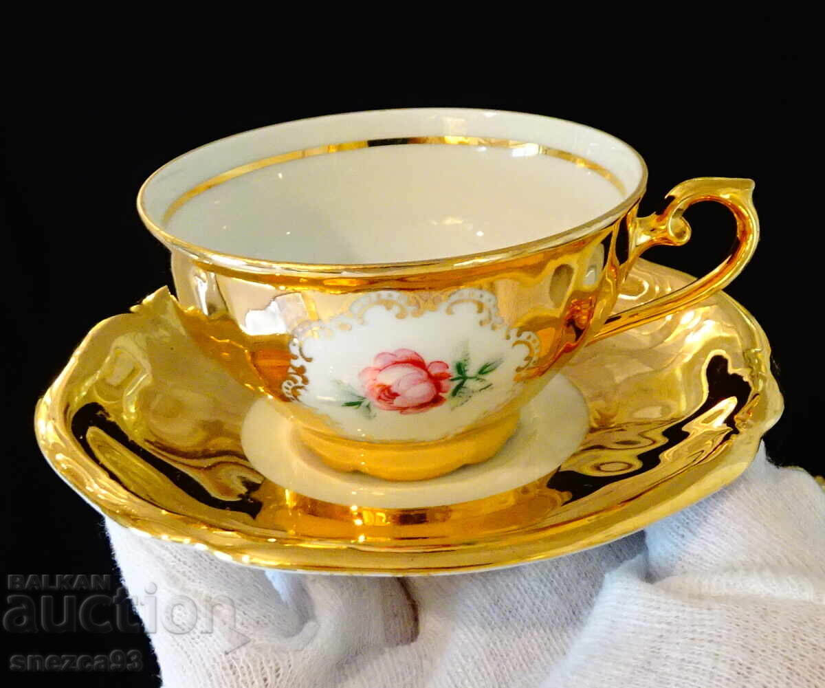 Bavarian porcelain cup and saucer, pure gold, rose, baroque Bavarian porcelain cup and saucer, pure gold, rose, baroque