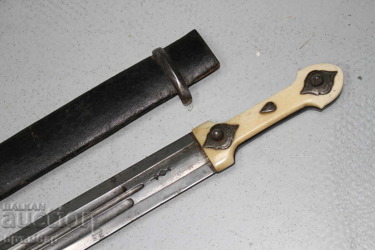 Delivery of Russian Caucasian dagger with silver ornaments on the hilt Delivery of Russian Caucasian dagger with silver ornaments on the hilt
