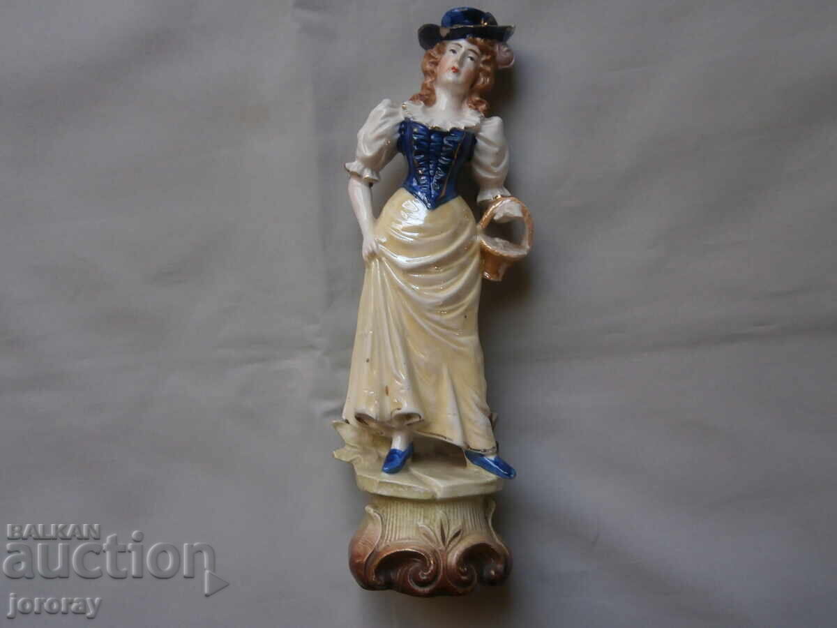 Porcelain figure 23cm with price 8.00 BGN | € 4.09 Porcelain figure 23cm with price 8.00 BGN | € 4.09