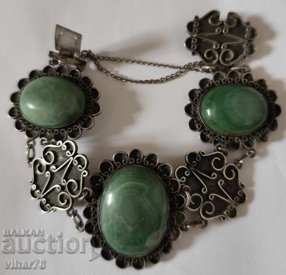 Auction  Silver bracelet with three large green stones