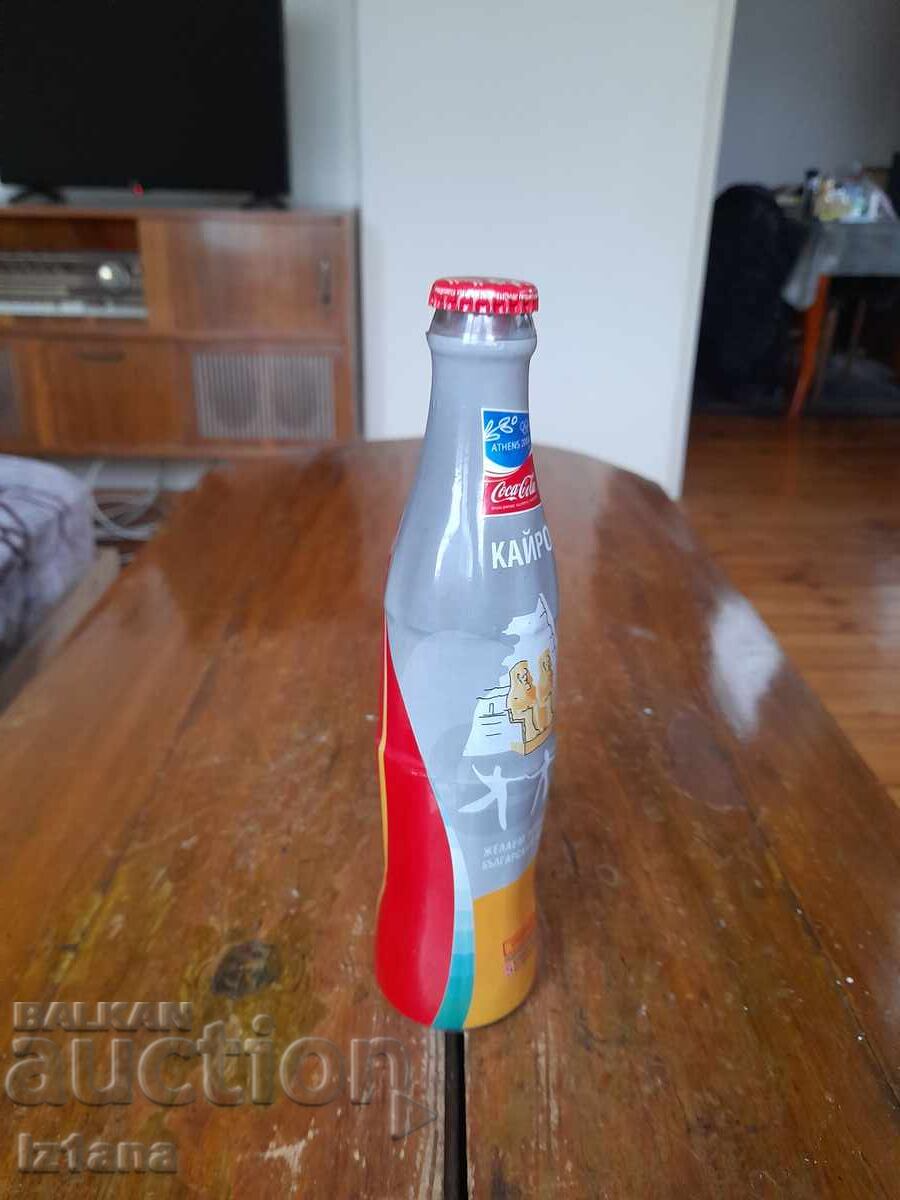 Παράδοση Ένα παλιό μπουκάλι Coca Cola, Coca Cola