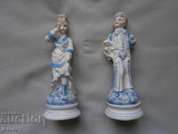 A pair of porcelain figures