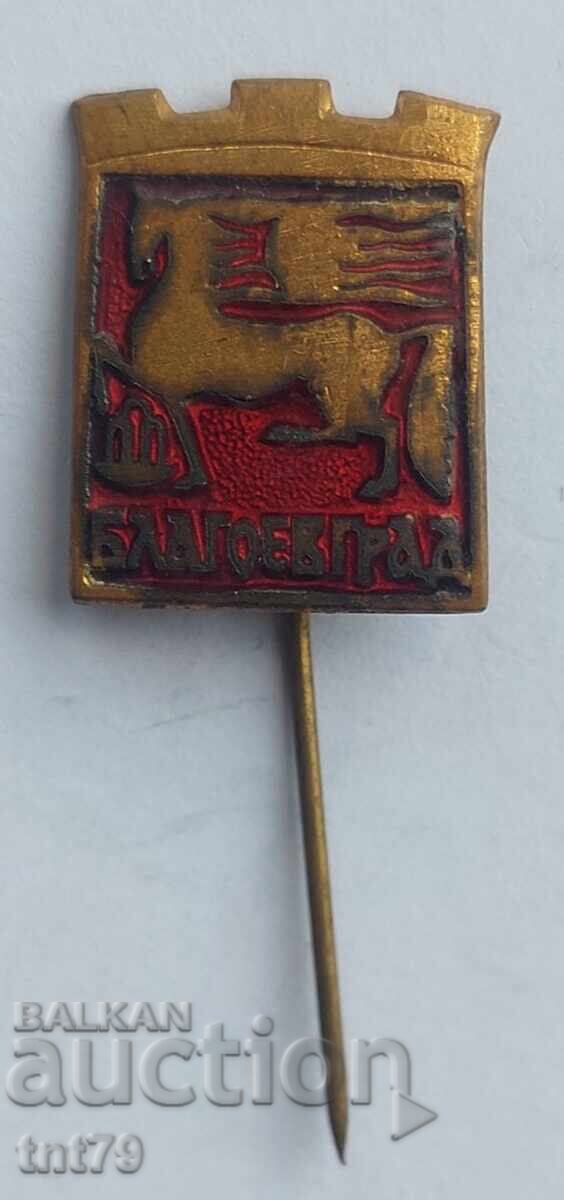 Badge: Coat of arms of the city of Blagoevgrad (red background).