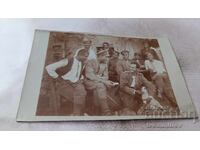 Photo of Sergeants and Soldiers with a Little Puppy at the Front 1918