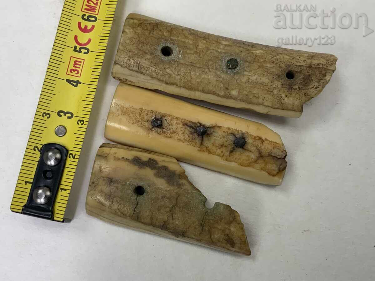 From a walrus tusk yatagan