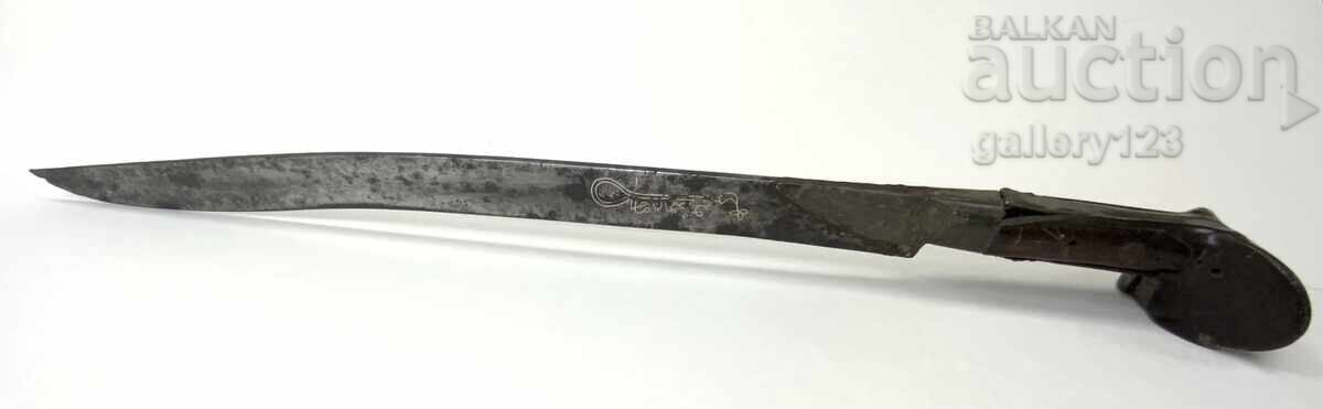 Revival-era yataghan, scales of buffalo horn, silver inlay