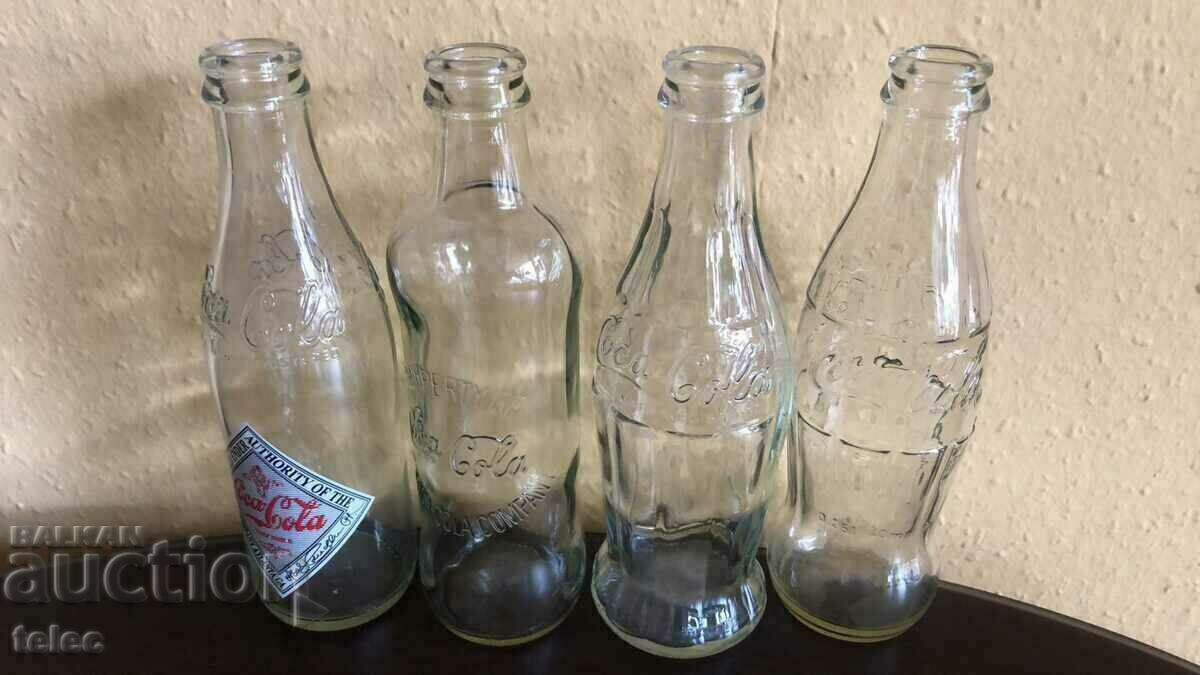 Set of 4 collectible Coca Cola bottles - Reduced price Set of 4 collectible Coca Cola bottles - Reduced price
