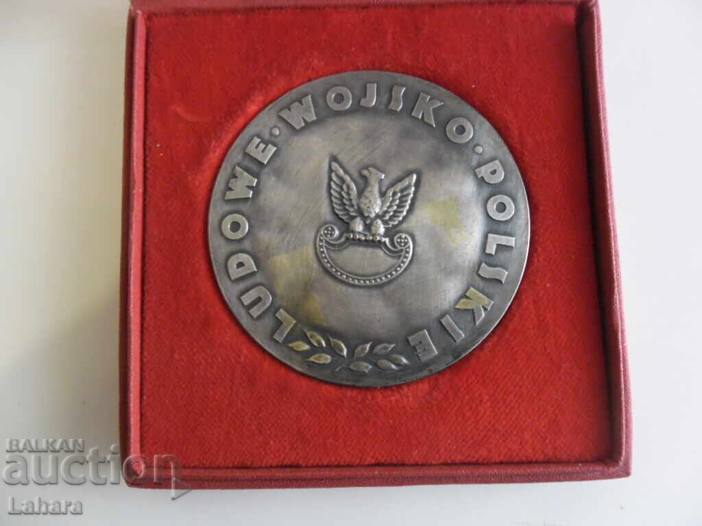 Delivery of Plaque Poland