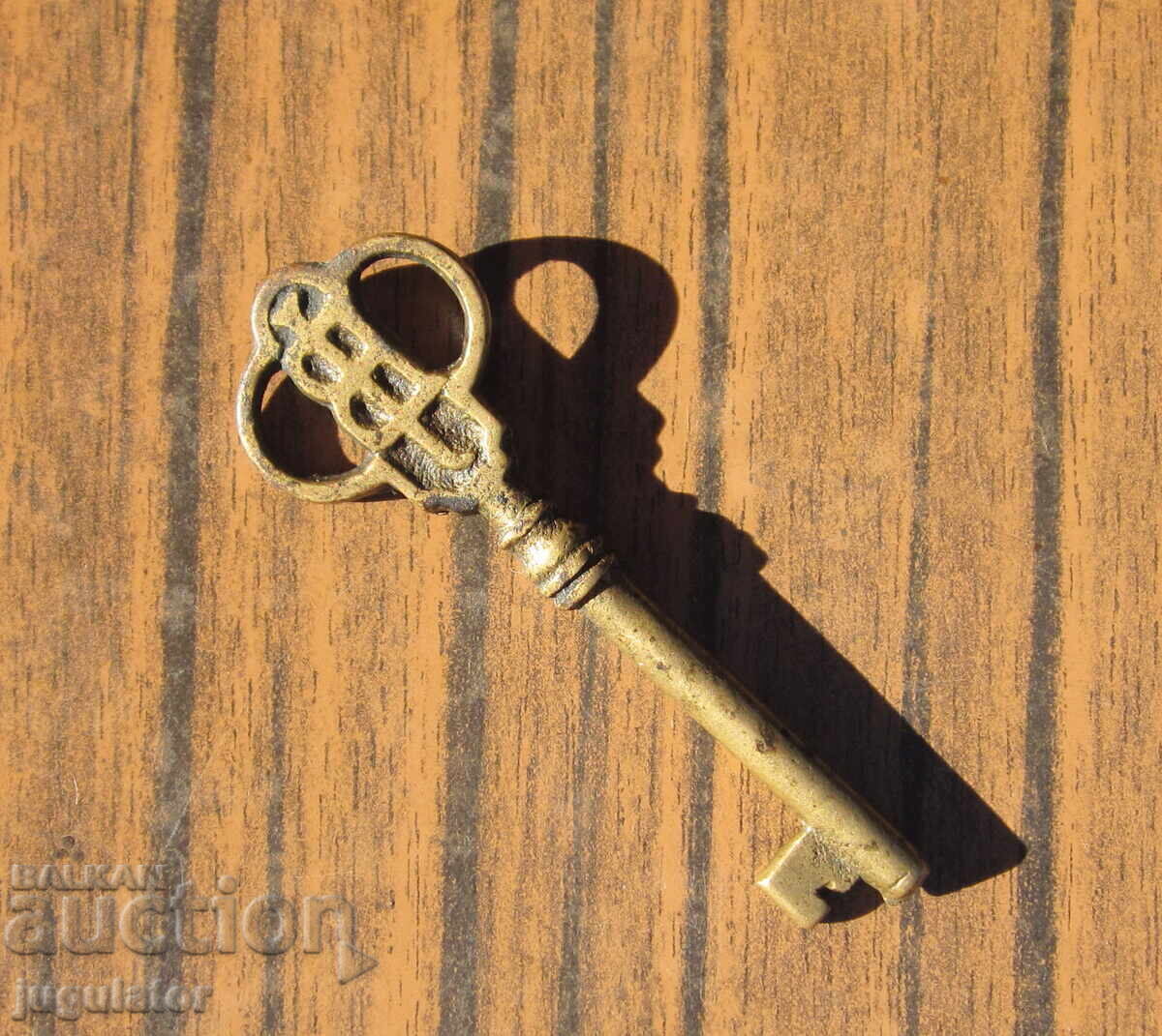 Auction  Old antique bronze key, bronze key from a safe JB