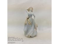 Old porcelain figurine Lady with a bow at the waist #2729