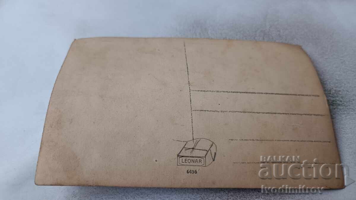 Photo of a little girl in a retro baby carriage in front of a pile of watermelons with price 3.65 BGN | € 1.87