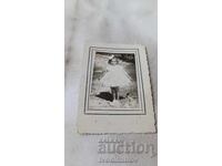 Fotografie Fetiță într-o rochie albă