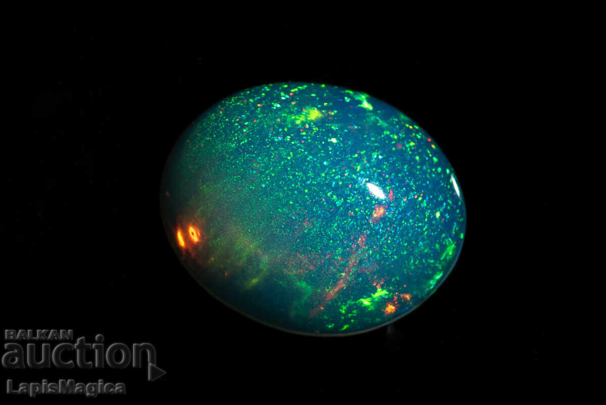 Аукцион Етиопски опал 1.08ct 9x7mm овален кабошон