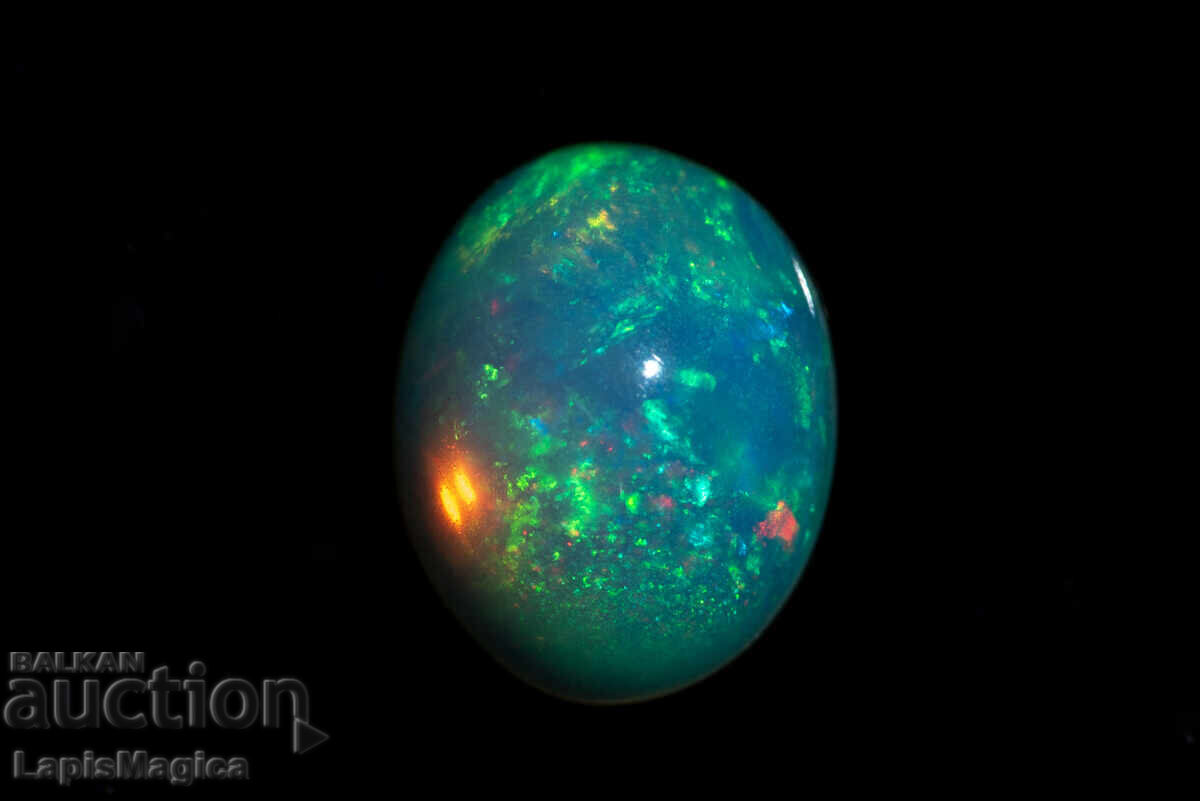 Livrarea Opal etiopian 1.28ct 9x7mm cabochon oval