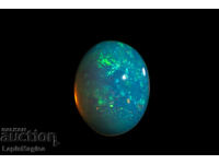 Етиопски опал 1.28ct 9x7mm овален кабошон