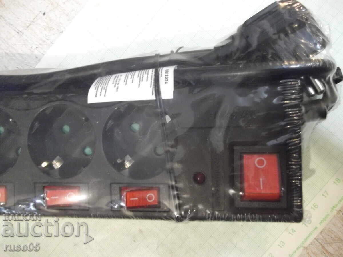 Auction Extension cord with a six-outlet power strip, new Auction Extension cord with a six-outlet power strip, new