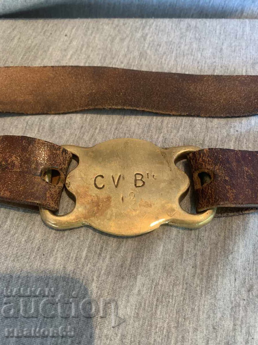 Auction  Old leather belt with brass buckle and decorations