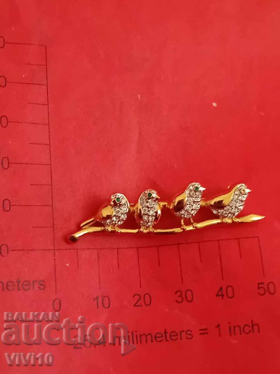 Antique brooch with stones