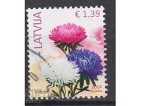 Timbrul poștal timbrat Flora Flori Astri 2014 din Letonia
