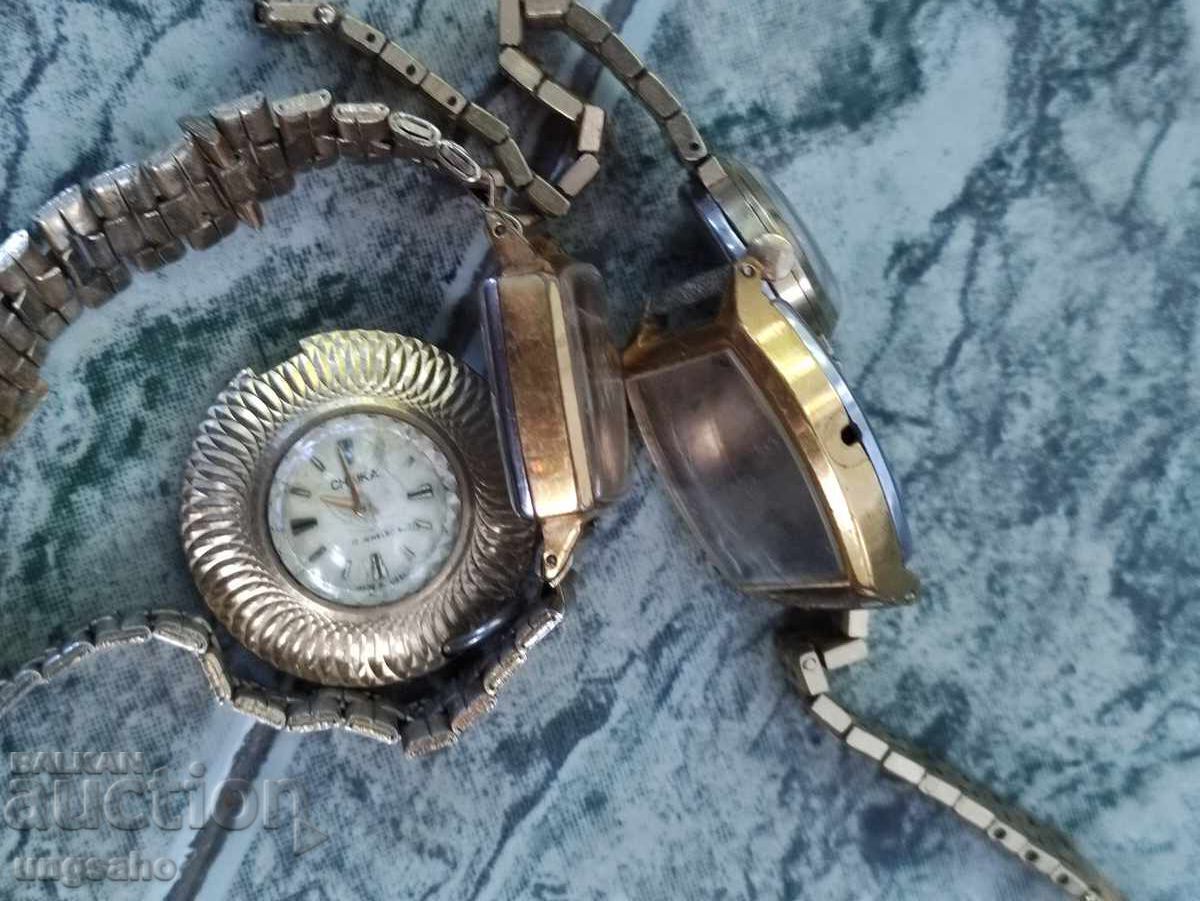 Auction  Gilded cases of Russian watches.