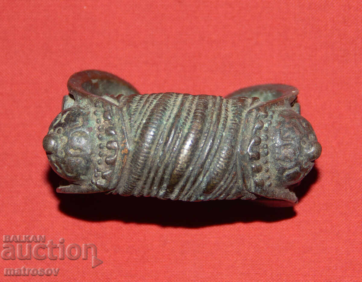 Old traditional bronze bracelet jewelry slingshot