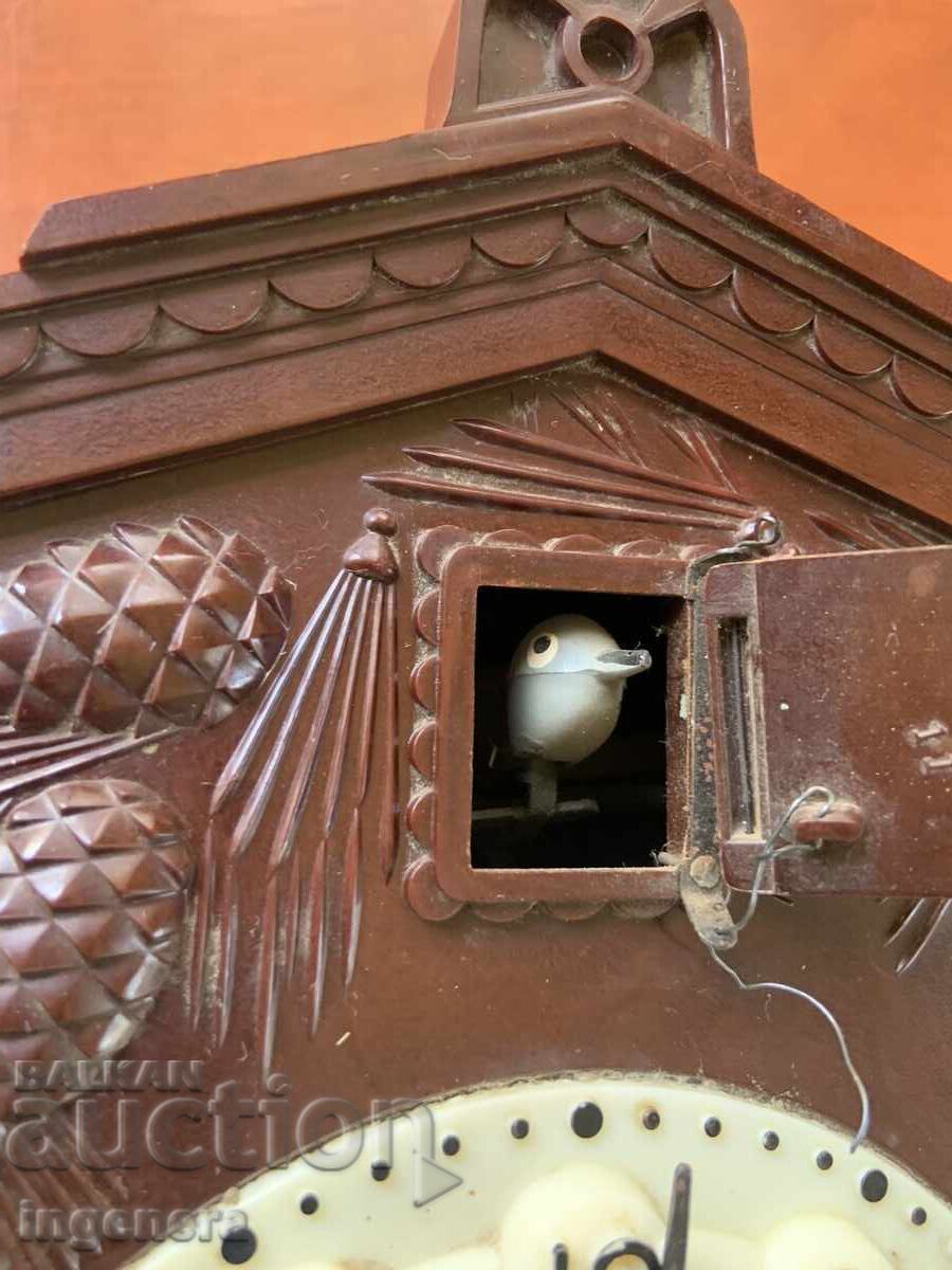 Delivery of Wall clock cuckoo weight